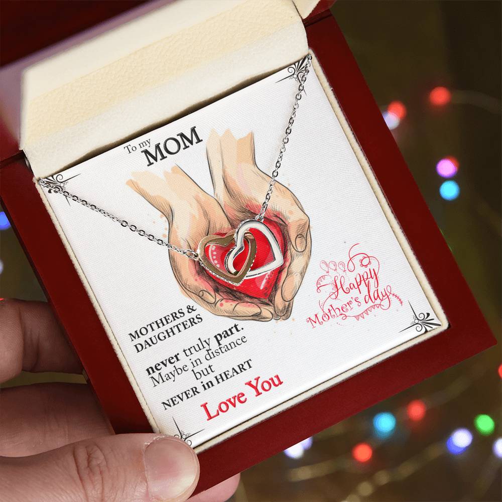 Mothers And Daughters Never Truly Part. Beautiful Necklace For Your Mom. Interlocking Hearts Necklace